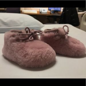 Pink furry baby UGG bootie shoe